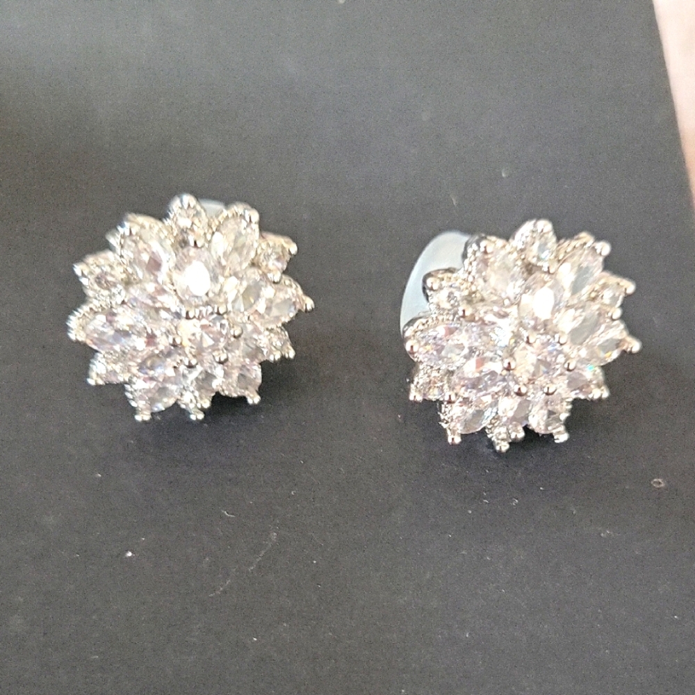 Silver Starburst Stud Earrings with Sparkling Stones